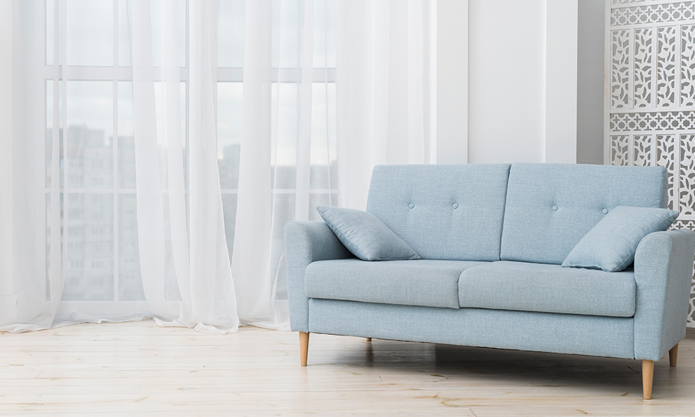 Housekeeper cleaning a hotel room